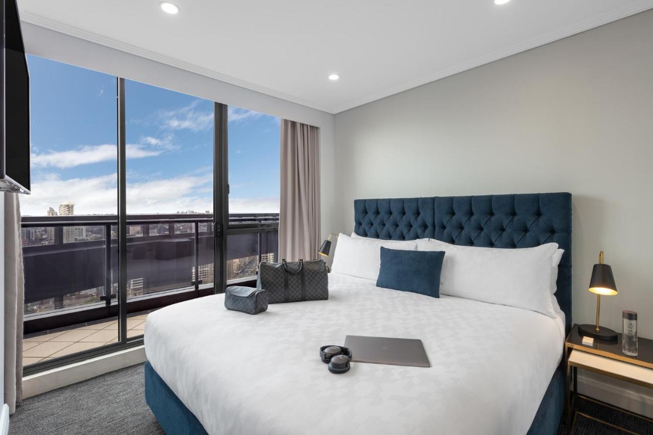 Meriton Suites Pitt Street, Sydney Eksteriør bilde A bedroom at the hotel
